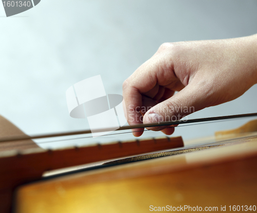 Image of Playing the guitar