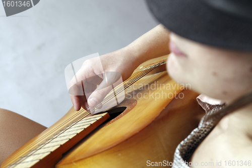 Image of Playing the guitar