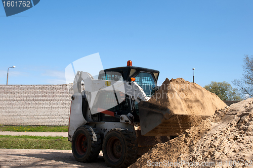 Image of A small excavator Bobcat