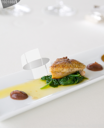 Image of Goose liver on spinach