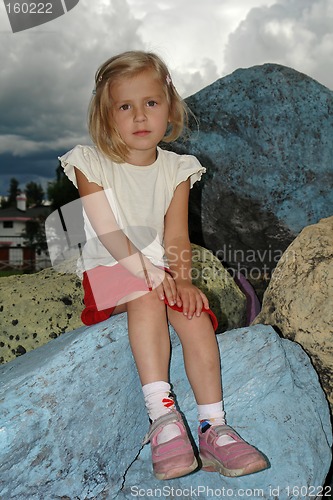 Image of the girl on the stone