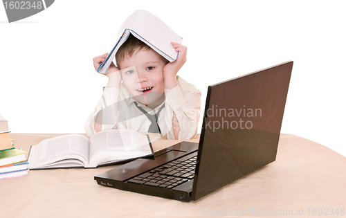 Image of pupil with book
