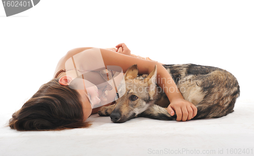 Image of young girl and her puppy