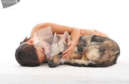 Image of young girl and her puppy