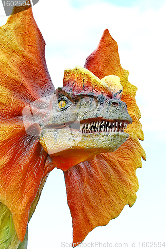 Image of Dilophosaurus dinosaur with orange collar