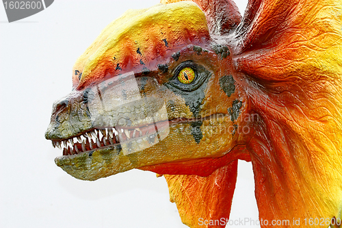 Image of Dilophosaurus dinosaur with orange collar