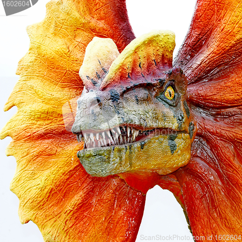 Image of Dilophosaurus dinosaur with orange collar