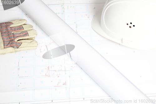 Image of Construction Plan with helmet and gloves