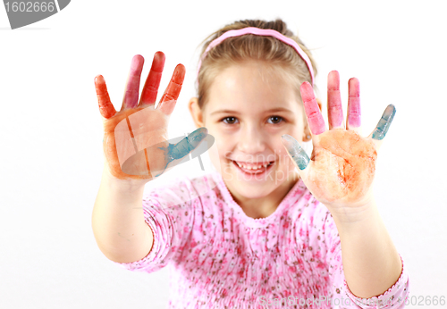 Image of Little girl with painted hands