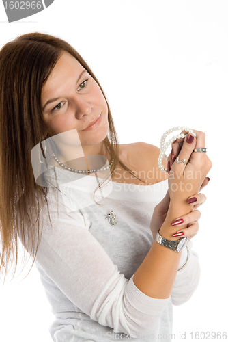 Image of Pretty woman talking by mobile phone