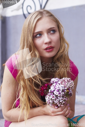 Image of Waiting girl with bouquet