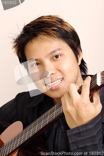 Image of Guitar player