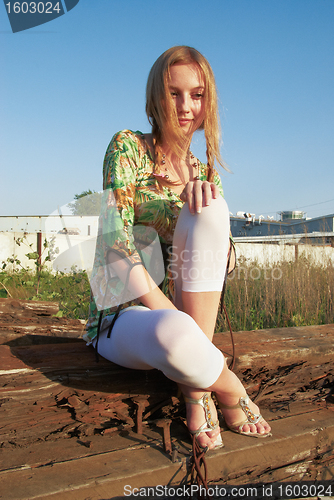 Image of Woman on industrial background