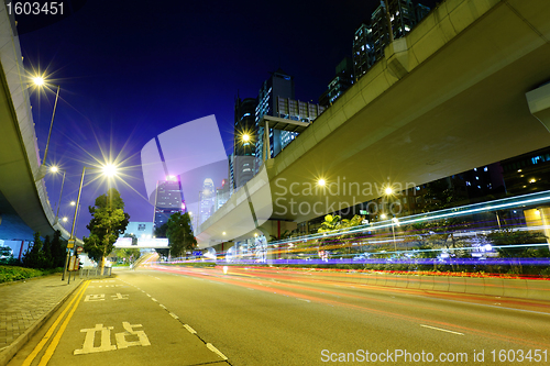 Image of highway light trails in city