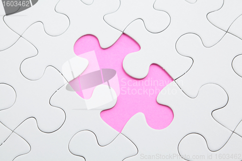 Image of puzzle with missing piece