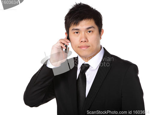 Image of young business man on the phone