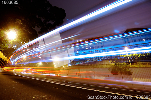 Image of night traffic light trail at night