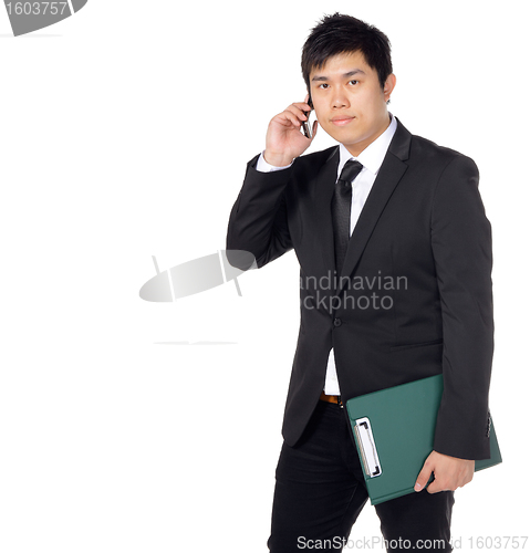 Image of young asian business man with file and phone