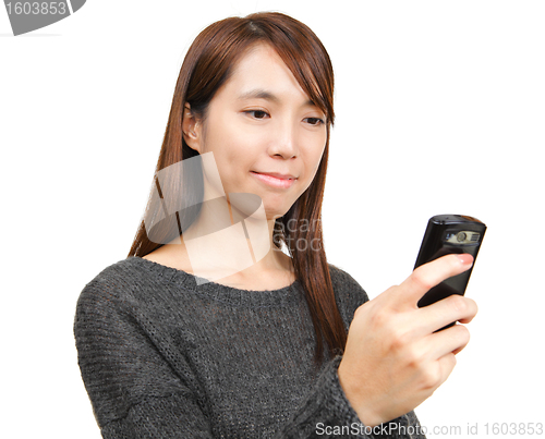 Image of girl text on mobile phone