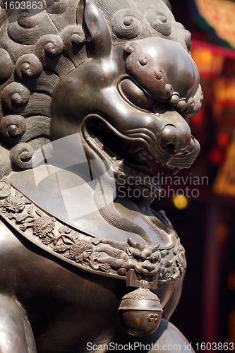 Image of bronze lion in chinese temple