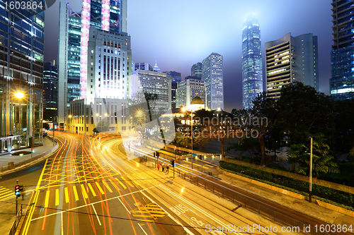 Image of traffic light stream and highrise buliding