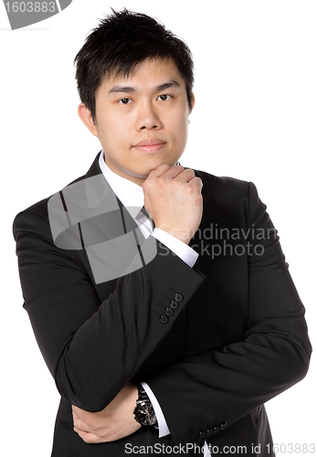 Image of young asian business man thinking