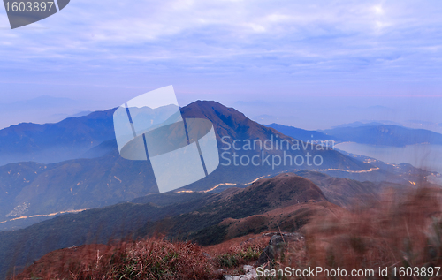 Image of mountain at night with road