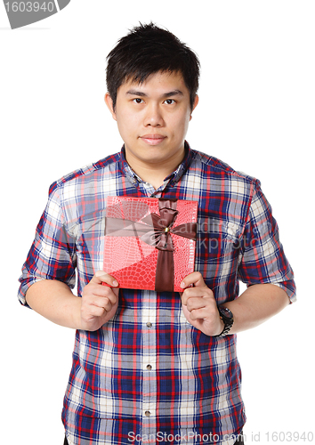 Image of young man give gift