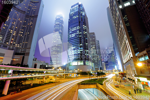 Image of traffic light stream and highrise buliding