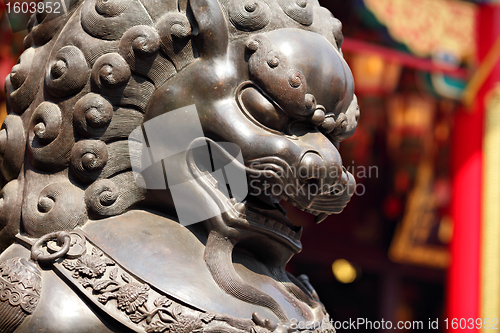 Image of Bronze lion in chinese temple