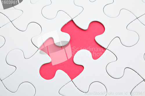 Image of puzzle with missing piece