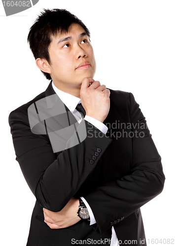 Image of young asian business man thinking