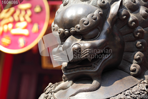 Image of Bronze lion in chinese temple