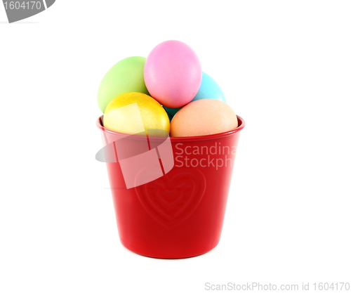 Image of Colorful Easter eggs in a red bucket.