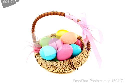 Image of Colorful Easter eggs in a basket.