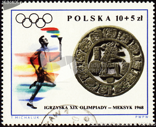 Image of Sportsman with torch on post stamp of Poland