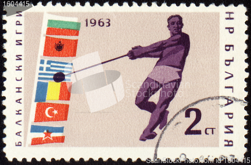 Image of Athlete with hammer on post stamp