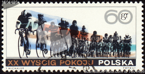 Image of Post stamp shows group of cyclists