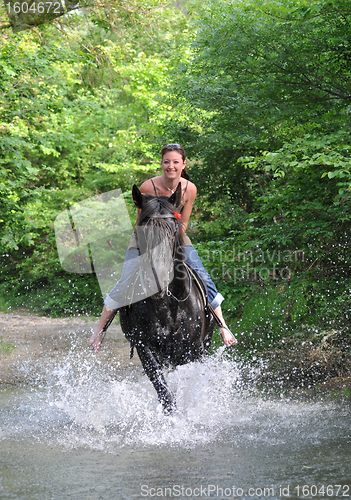 Image of riding woman