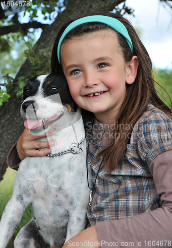 Image of little girl and dog