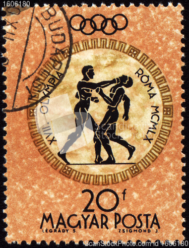 Image of Post stamp shows boxing in ancient style