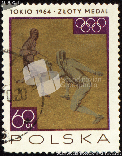 Image of Two fighting fencers on post stamp