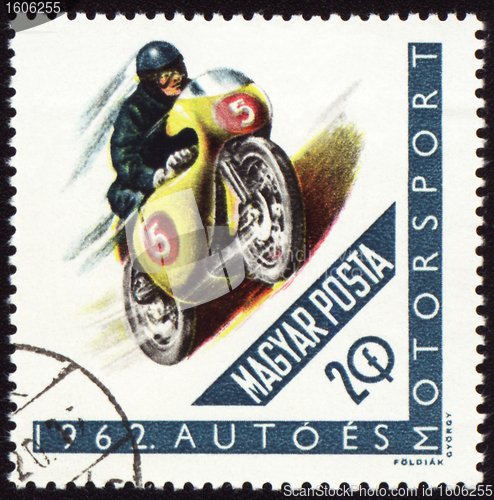 Image of Post stamp shows motorcyclist