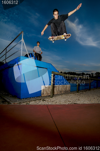 Image of Skateboarder flying