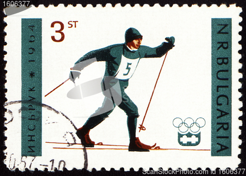 Image of Running skier on post stamp