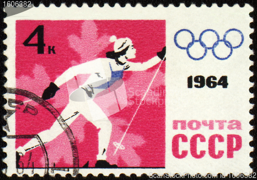 Image of Running skier on post stamp