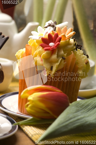 Image of Spring muffins decorated with flower petals with tulips 