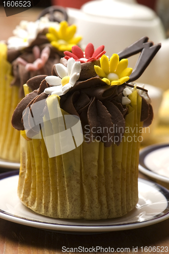 Image of Spring muffins decorated with flower petals with tulips 