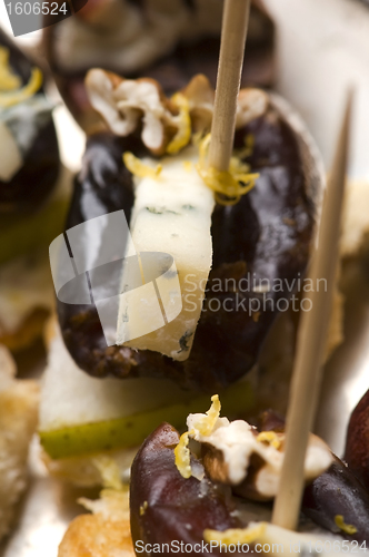 Image of Appetizer Plate with Dactyl, Pecan nuts and Cheese