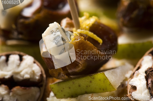 Image of Appetizer Plate with Dactyl, Pecan nuts and Cheese